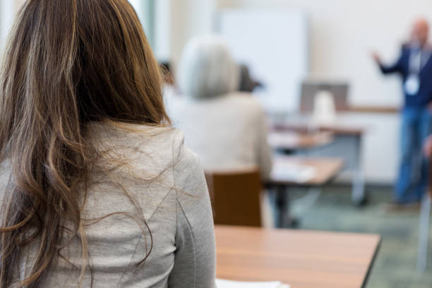 istock A mid adult woman attends continuing ed classes 1145048710