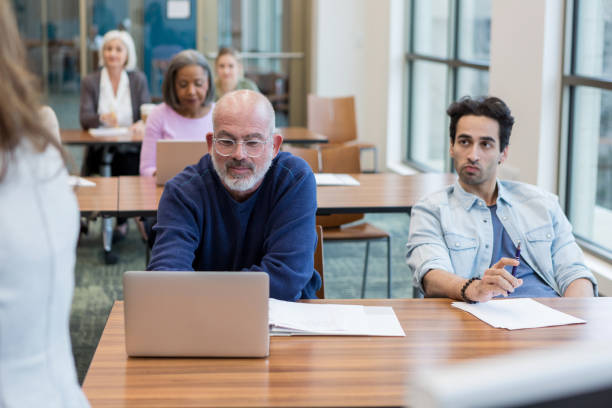 istock A mature adult learns to use a new program 1145048718