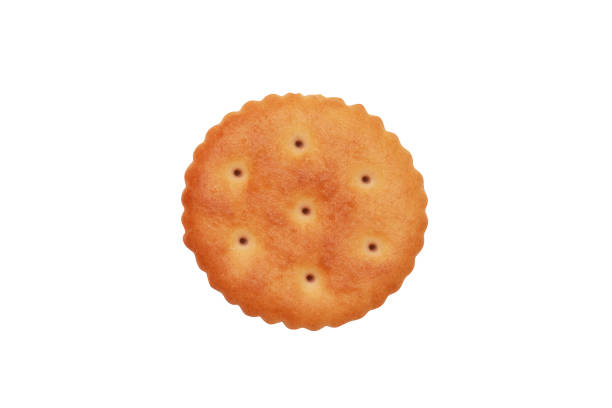 istock Close up of round cracker on white background. 1145049926