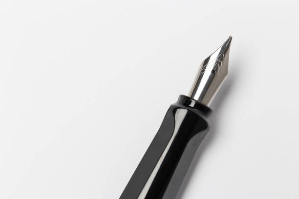 istock Black fountain pen isolated on white background 1145052698