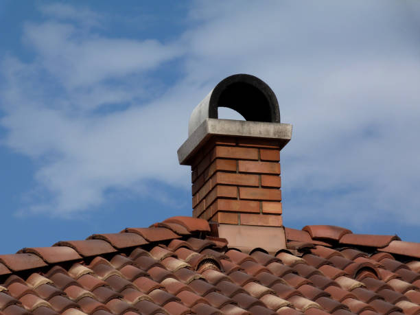 istock brick chimneys with arched concrete cap stone 1145054027