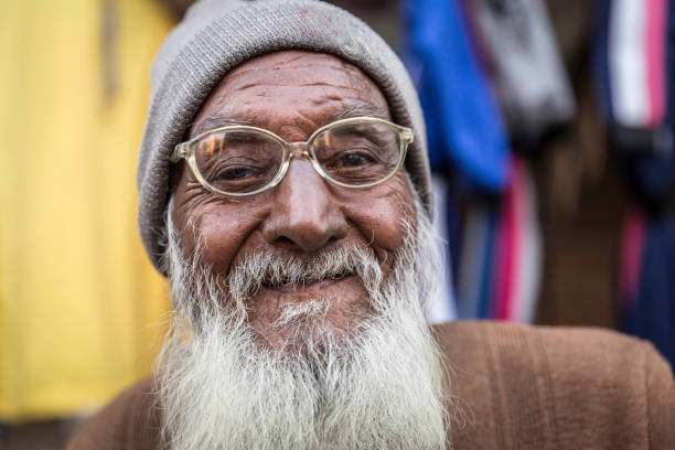 Portrait Of Happy Man Against Wall
