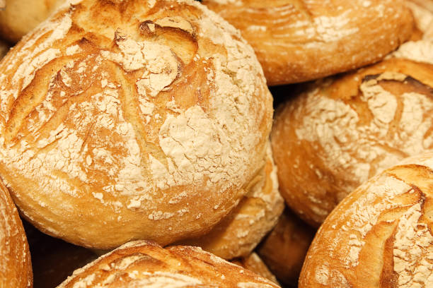 istock Fresh Baked White Bread Close Up By Group 1145057027