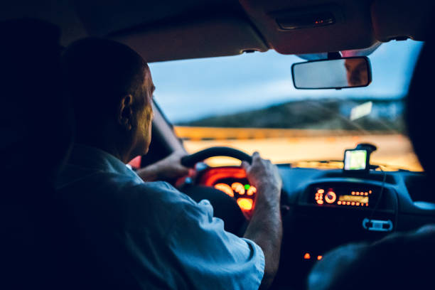 istock Senior man driving car 1145058839