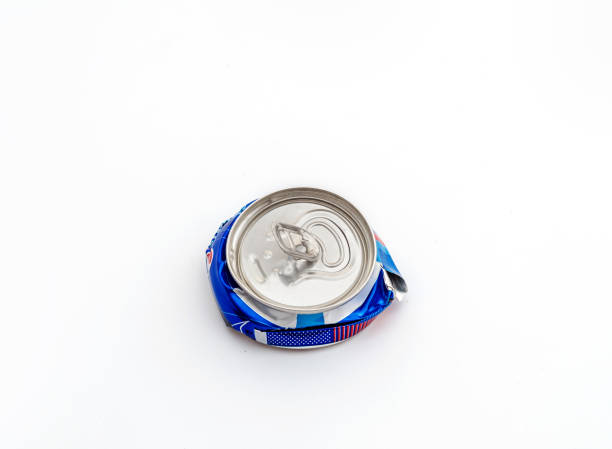 istock Crushed compressed aluminum carbonated drink can. Pollution, waste, ecology 1145060495