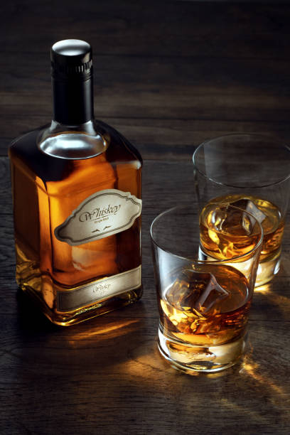 istock whiskey and two glasses 1145060844
