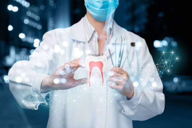 istock A doctor operating with the digital tooth model. 1145062057