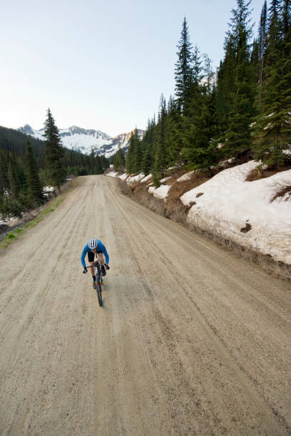 istock Gravel Road Bicycle Rider 1145062388