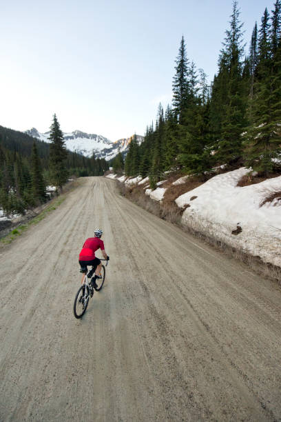 istock Gravel Road Bicycle Rider 1145062463