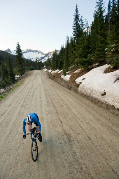 istock Gravel Road Bicycle Rider 1145062547