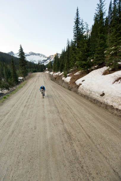 istock Gravel Road Bicycle Rider 1145063121