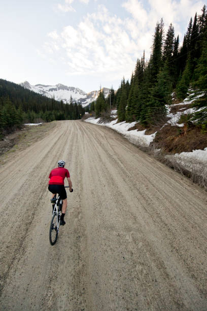 istock Gravel Road Bicycle Rider 1145063188