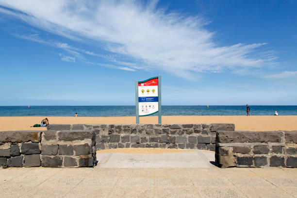 Williamstown Beach Information Sign - Melbourne Williamstown, Australia: March 07, 2019: Williamstown Beach in Melbourne is a popular tourist area during the summer holidays with sign posts giving directional and safety information. port melbourne melbourne stock pictures, royalty-free photos & images