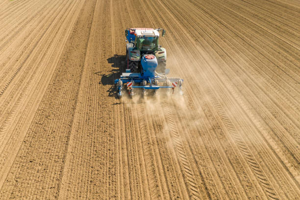 istock maize sowing tractor on dry field in southern germany 1145066179