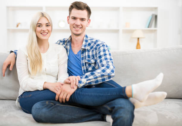 istock The smile couple rest on the sofa 1145066660