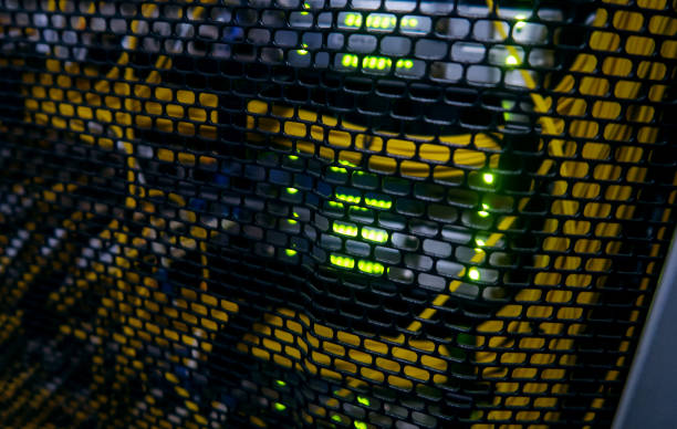 istock Fiber Optical connector interface. Fibre Channel swich. Severs computer in a rack at the large data center 1145070102