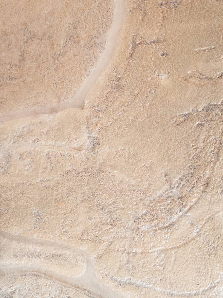 istock Abstract background of sand under ice. 1145072926
