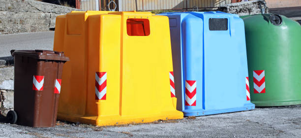 istock four colored dumpster to recycle the garbage 1145074053