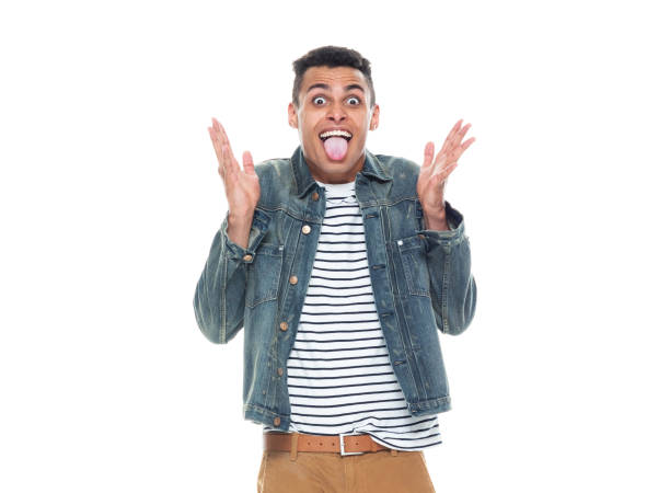 istock Good looking African American black man wearing a jean jacket - making a silly face 1145077358