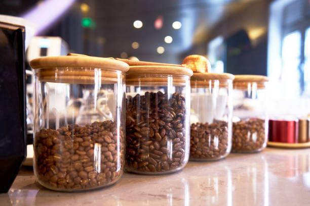 Four jars of coffee beans