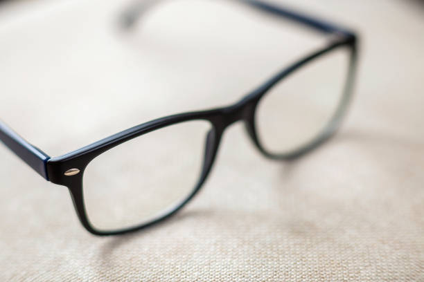istock Reading spectacles, fashionable eyeglasses isolated on blurred white copy space background. 1145081491