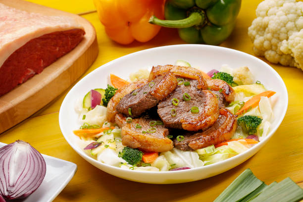 istock Picanha with salad on wooden background 1145084937