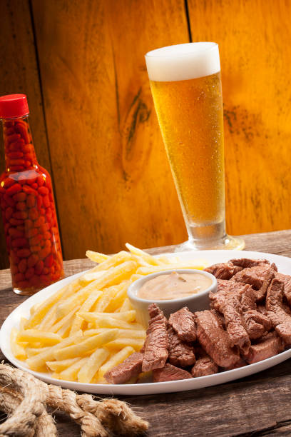 Steak with fried Batafa and Chopp