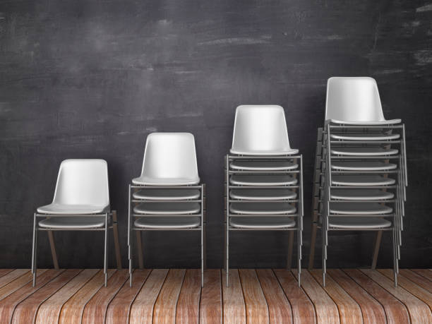 istock Row of Chairs on Wood Floor - Chalkboard Background - 3D Rendering 1145086427