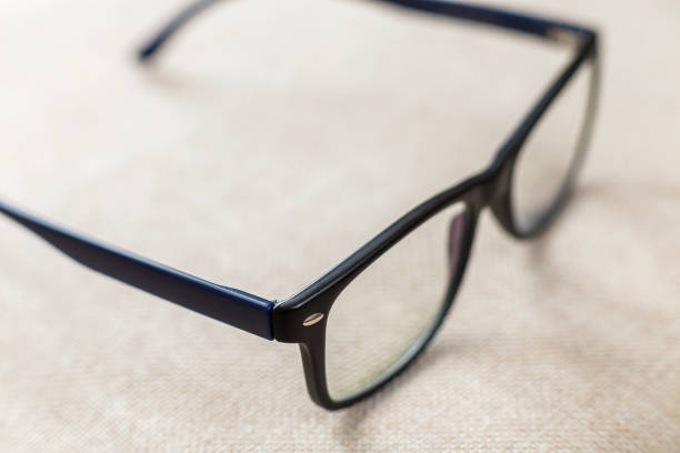 istock Reading spectacles, fashionable eyeglasses isolated on blurred white copy space background. 1145087874