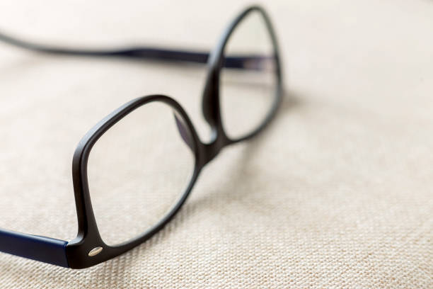 istock Reading spectacles, fashionable eyeglasses isolated on blurred white copy space background. 1145087879