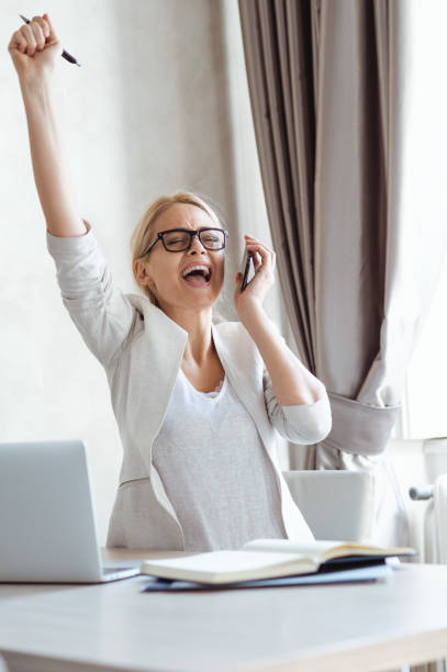 istock Business woman celebrating the win 1145089314