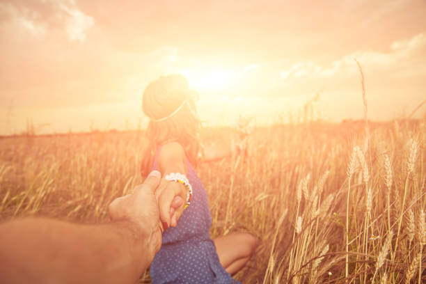 istock Young couple enjoying in a wheat field. 1145091679