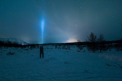 Dark star sky in snow landscape