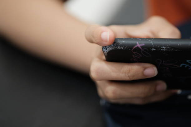 istock Woman enjoy with mobile game in hands 1145094632