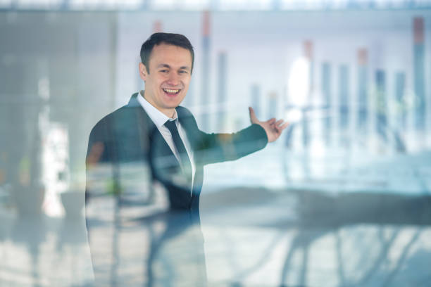 istock The happy man gesture over the window 1145094922