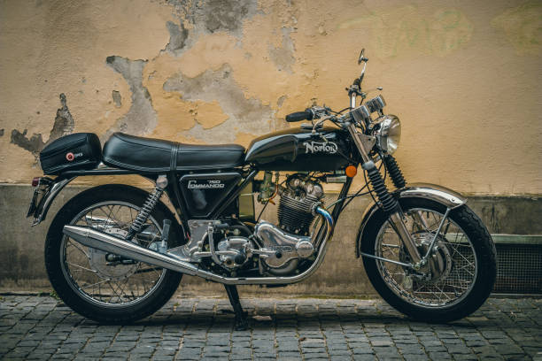 Konstanz, Germany - April 21, 2019: Norton Commando 750 motorcycle standing by an old rugged wall.