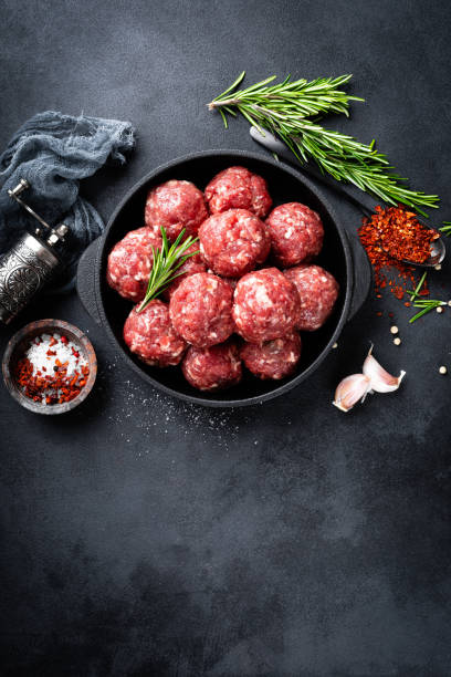 istock Fresh raw beef meatballs with spices 1145102928