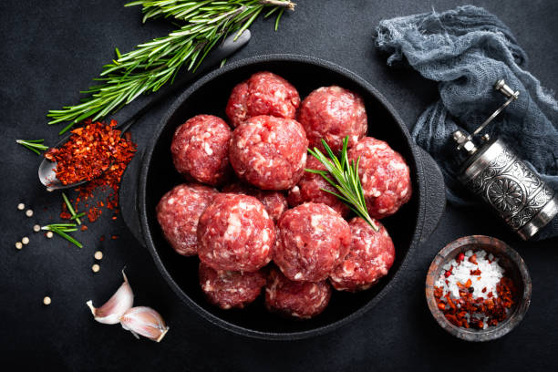 istock Fresh raw beef meatballs with spices 1145102950