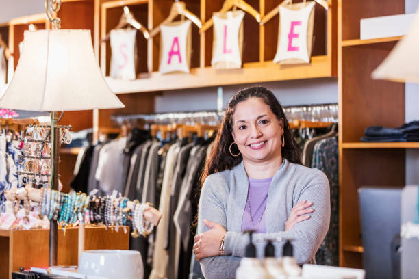 istock Hispanic woman working in boutique 1145102990