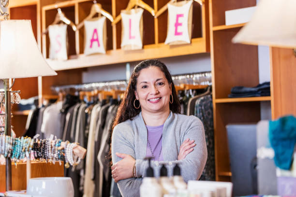 istock Hispanic woman working in boutique 1145103163