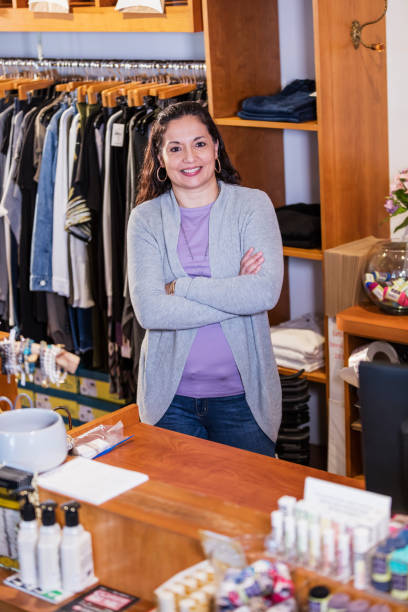 istock Hispanic woman working in boutique 1145103356
