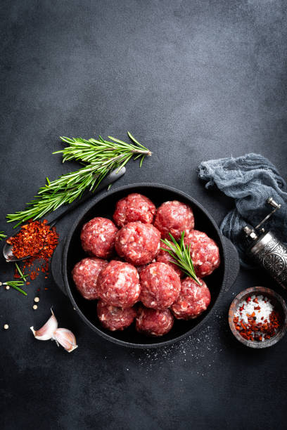 istock Fresh raw beef meatballs with spices 1145103378