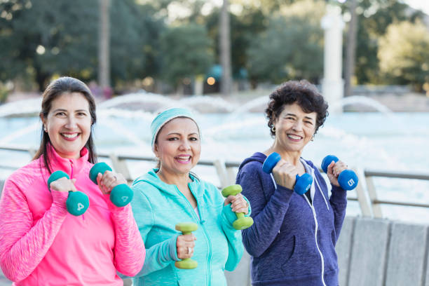 istock Three Hispanic women exercising together 1145106723