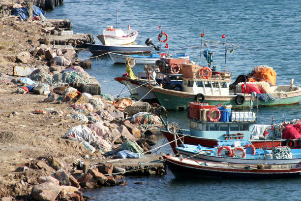 fishing boats at a village harbor - babakale imagens e fotografias de stock