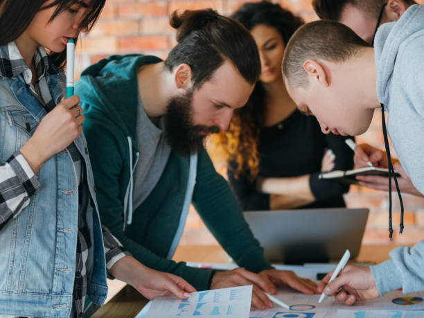 istock sale analysis millennials colleagues collaboration 1145121722