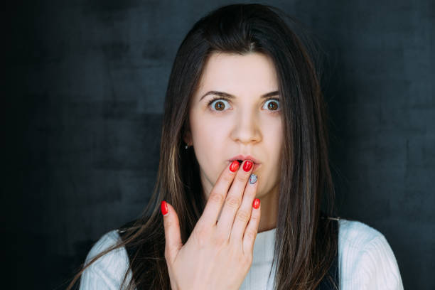 istock stunned young woman breaking news omg speechless 1145121729