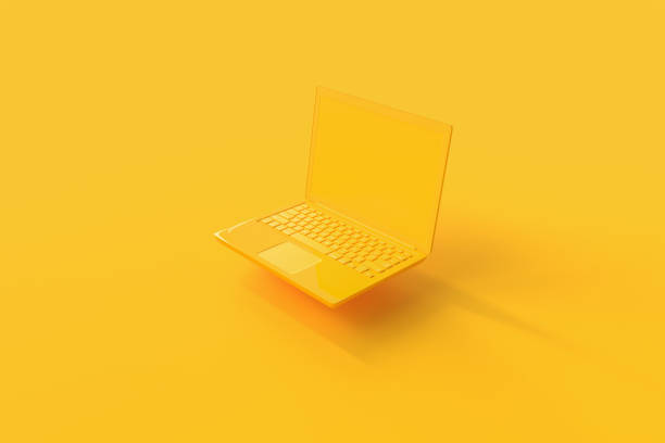 istock Laptop background with blank screen yellow color 1145126242