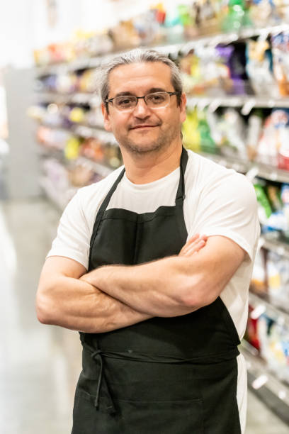istock Mature man working at a supermarket 1145127100