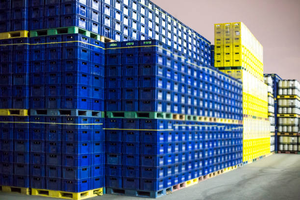 plastic colorful beer crates stacked stock photo