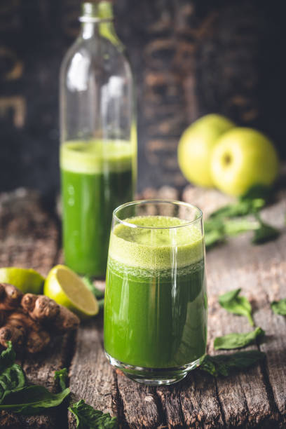 istock Healthy spinach smoothie or fruit juice, Apple, ginger 1145138460